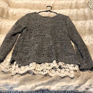 Long sleeve sweater with lace detail at bottom